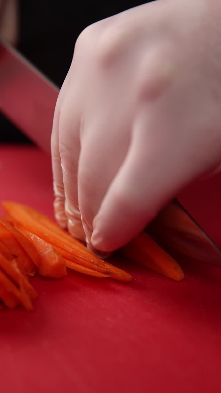 Chef Slicing Carrots