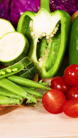 assorted vegetables arranged on a black background