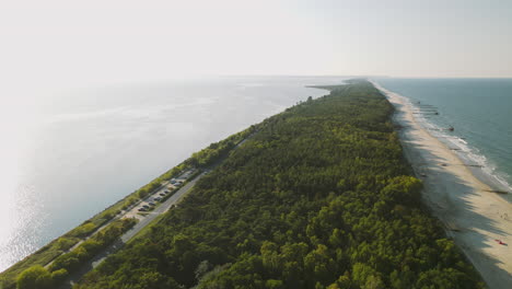 descending aerial view of hel peninsula at the coastline of baltic sea