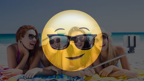 cara sonriente con gafas de sol animación sobre amigos tomando selfies en la playa