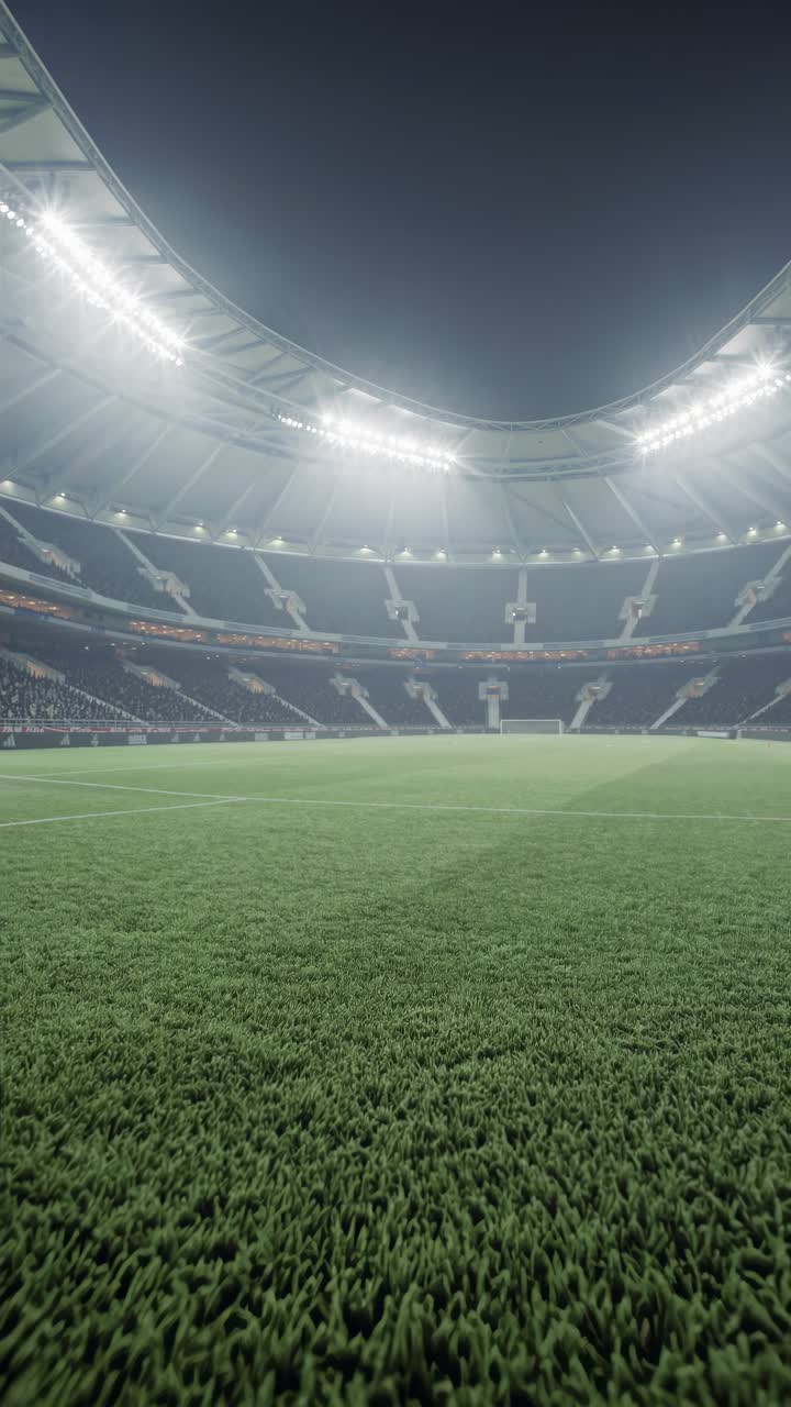 Capturing a ground-level perspective of a vibrant soccer field in a large stadium, illuminated by bright lights during the night, with enthusiastic fans eagerly watching the thrilling game