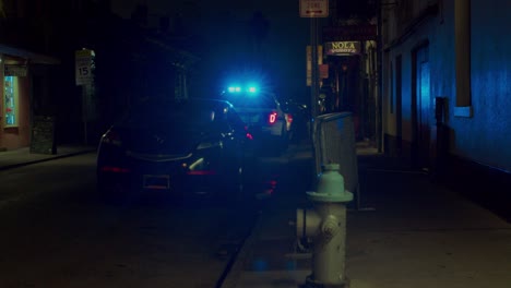 Police-Car-in-Downtown-New-Orleans-Siren-On---Night---NOLA