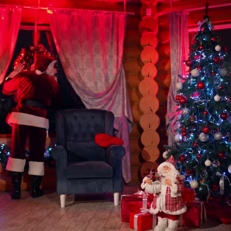 santa claus in house at night. santa claus in beautiful room during christmas night