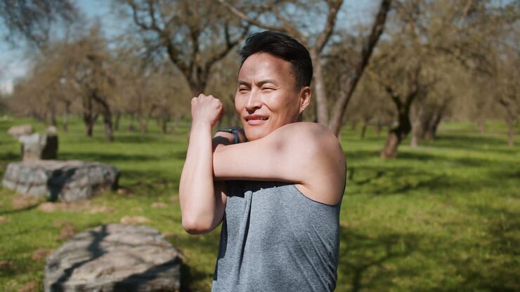 Man stretching outdoors