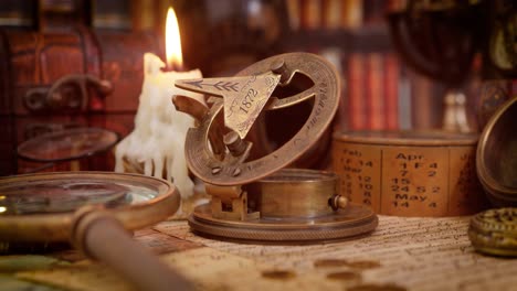 vintage style travel and adventure. vintage old compass and other vintage items on the table.