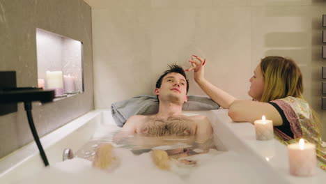 couple relaxing in a bubble bath
