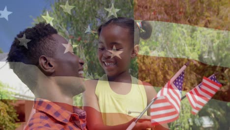 animación de la bandera de los estados unidos sobre un feliz padre y hija afroamericanos con banderas de la ua