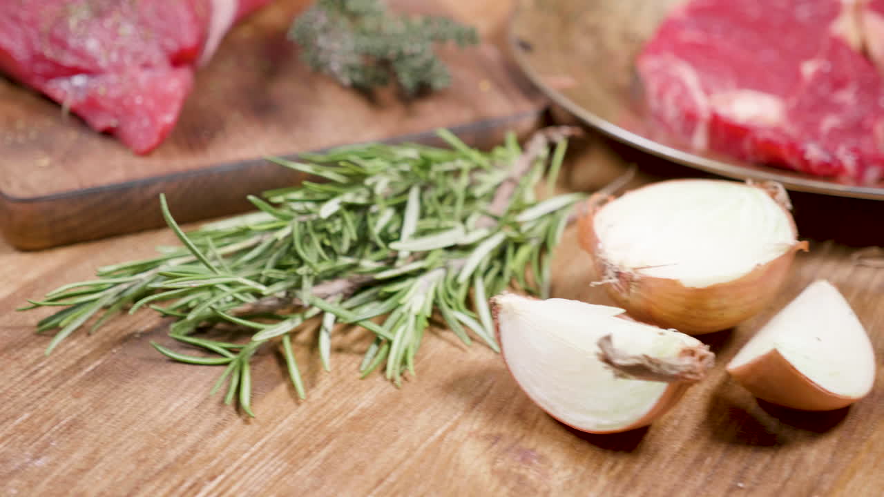 Beef with Herbs on Wooden Board
