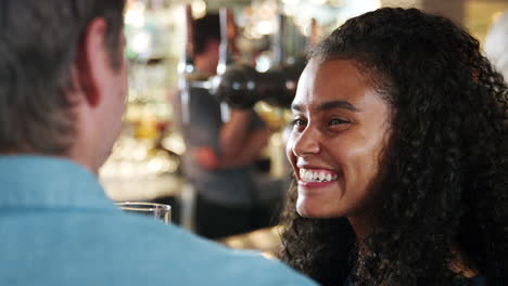 Close-Up-Couple-On-Date-Meeting-For-Drinks-In-Cocktail-Bar