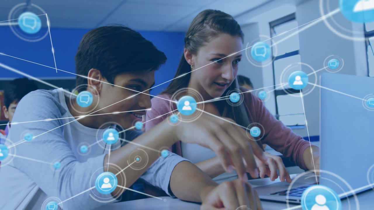 In school, students collaborating on laptop with digital network animation overlay