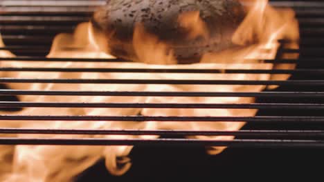 burger bun grilling on a barbecue grill