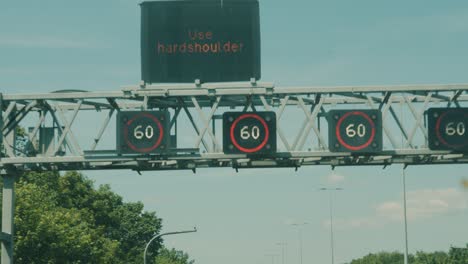 Car-POV-Travelling-Along-Smart-Motorway-M4-at-Bristol-UK-with-Speed-Camera-Warning