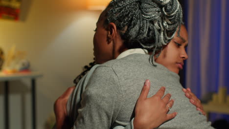 mother and daughter hugging