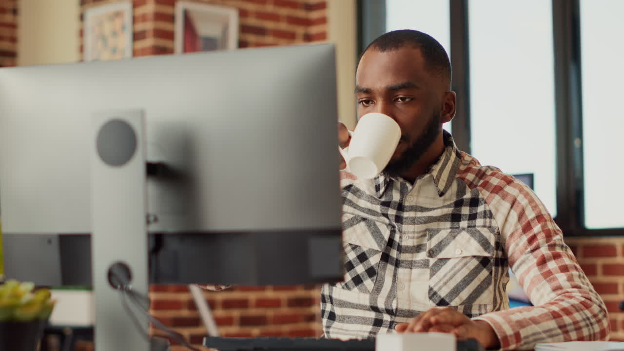 Male freelancer doing remote work at home to plan sales report