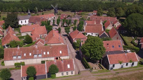 Flight-over-Fortified-Town-Bourtange-during-a-bright-summer-day,-aerial