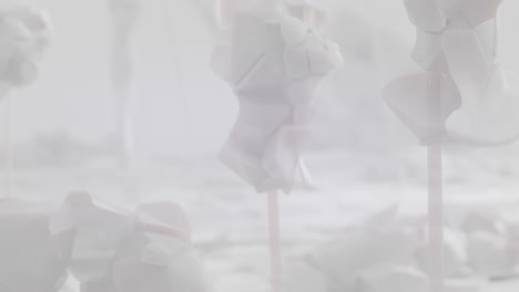 crushed android shells on spikes on a foggy, white junkyard