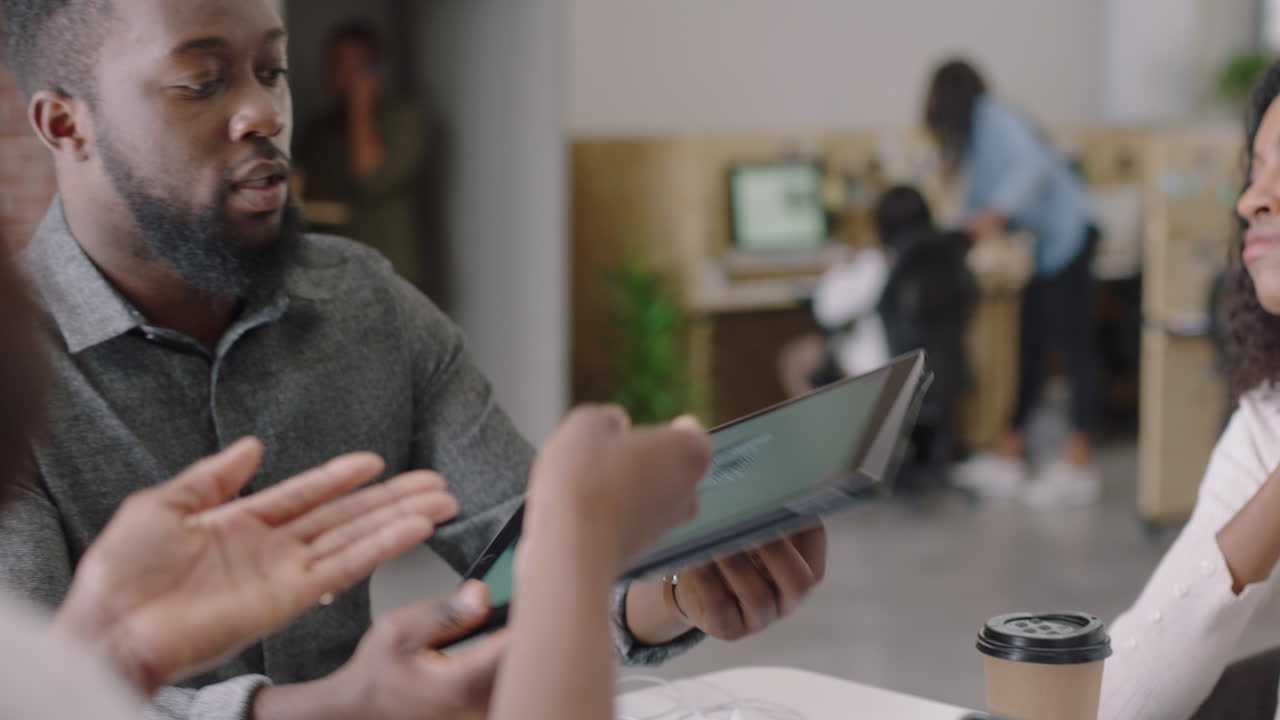 african american business people brainstorming engineers designing prototype engine turbine using tablet computer 3d technology creative team collaborating teamwork sharing ideas in office meeting