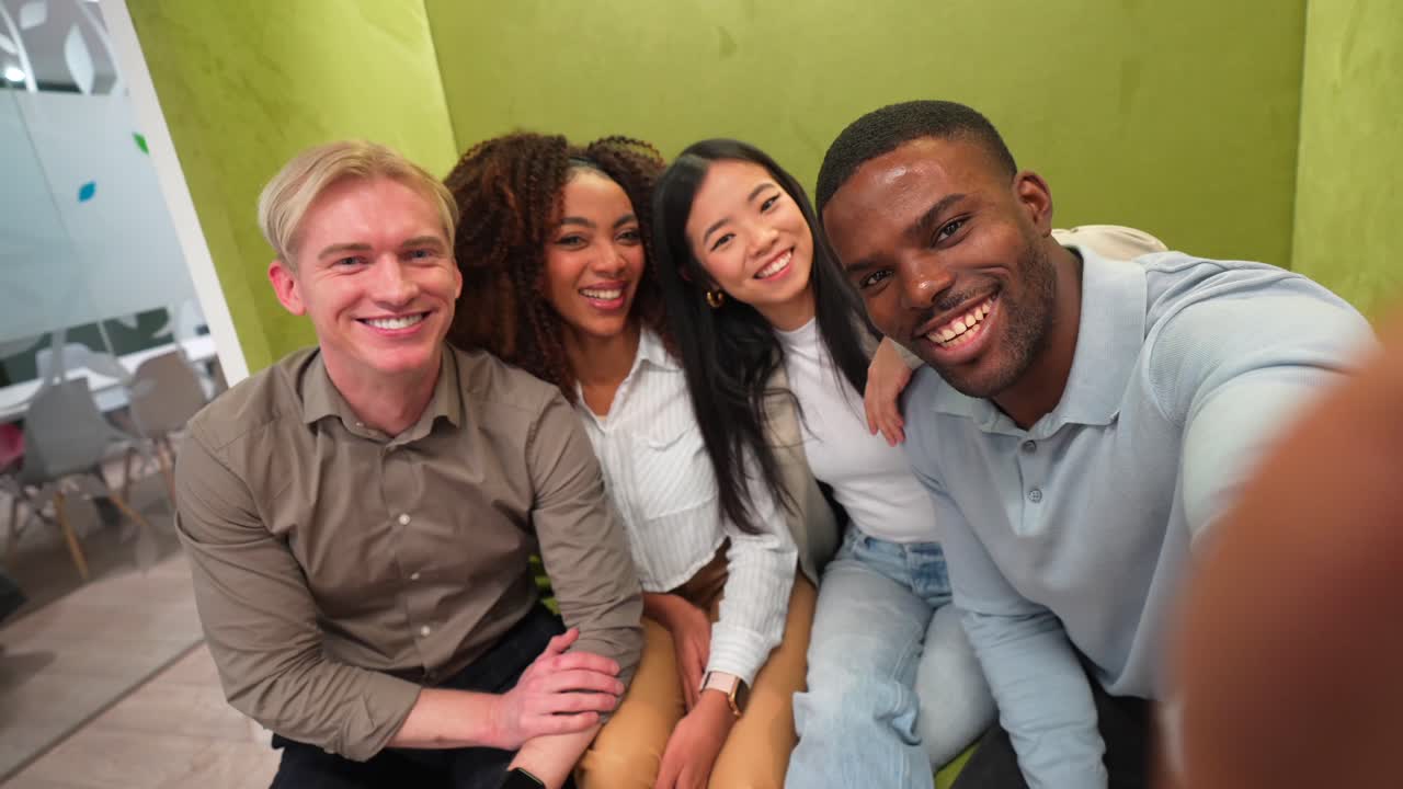 Group selfie of happy friends and colleagues