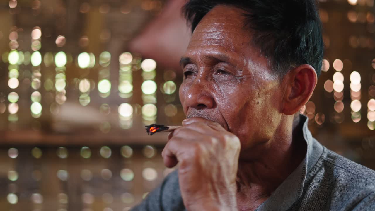 Senior man smoking a cigarette