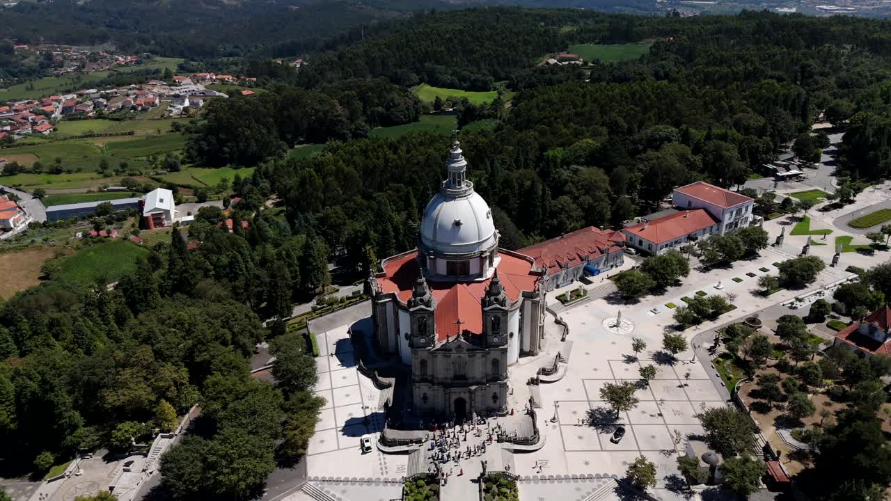Aerial view of the Sameiro Sanctuary in Braga with surrounding forested hills.