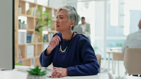business, computer and confused senior woman