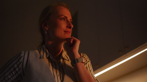 Pensive Woman Looking at Sun's Rays
