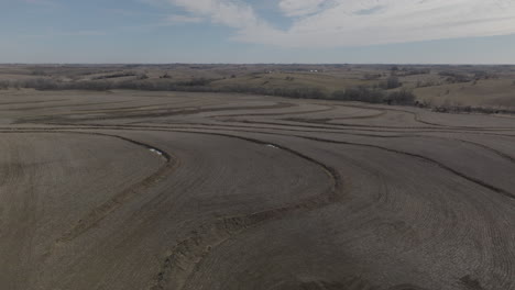 Dramatic-aerial-view-of-terraced-farm-fields,-to-prevent-erosion