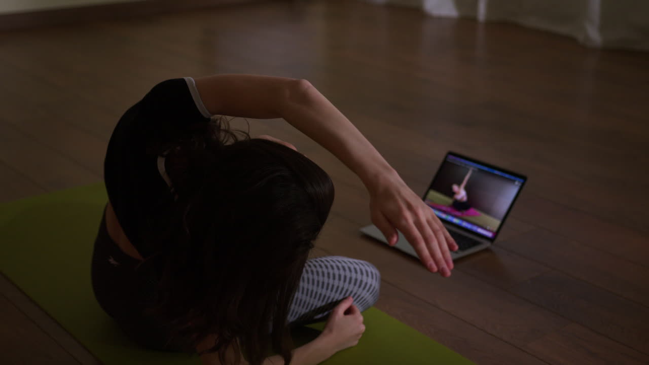 Woman Doing Yoga Stretches Online