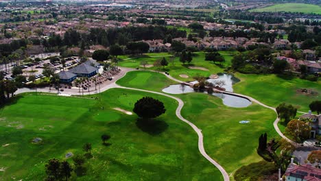 drone shot of golf course in golf community in san diego, california