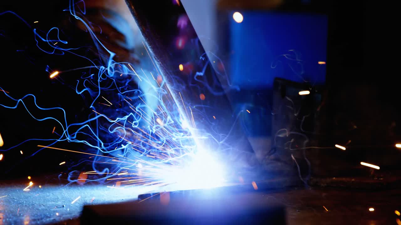 Welder welding a metal