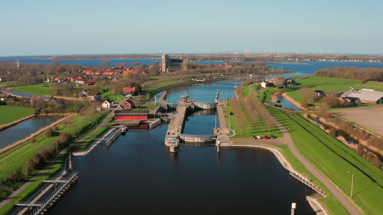 Aerial view of a canal lock in a historic town