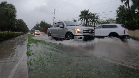 driving through flooded road in slow motion, florida, usa