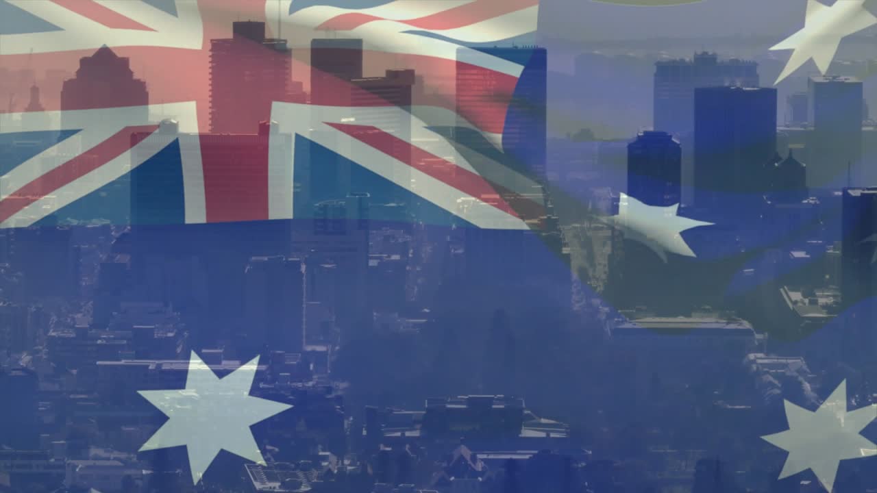 At first frame sheer Aussie flag rippling and shifting Union Jack and stars, revealing hazy skyline