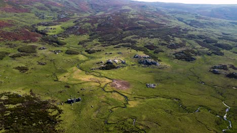 Meandering-winding-river-in-sierra-segundera-zamora-spain,-cloudy-overcast-aerial-drone-overview