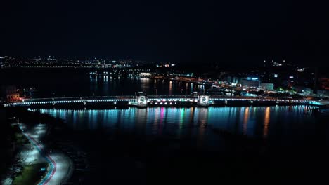 aerial night view galata bridge and golden horn. 4k footage in turkey