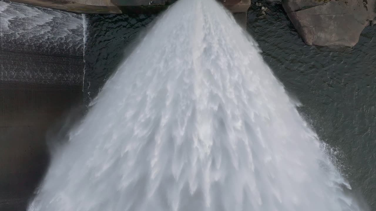 Splashing Water Dam Pipeline Of Presa Barrie In Negreira, A Coruña, Spain. Slow Motion Shot