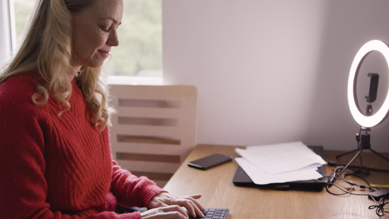 Woman working on a computer at a desk