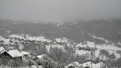 time lapse of falling snow over meribel ski resort in the french alps in winter