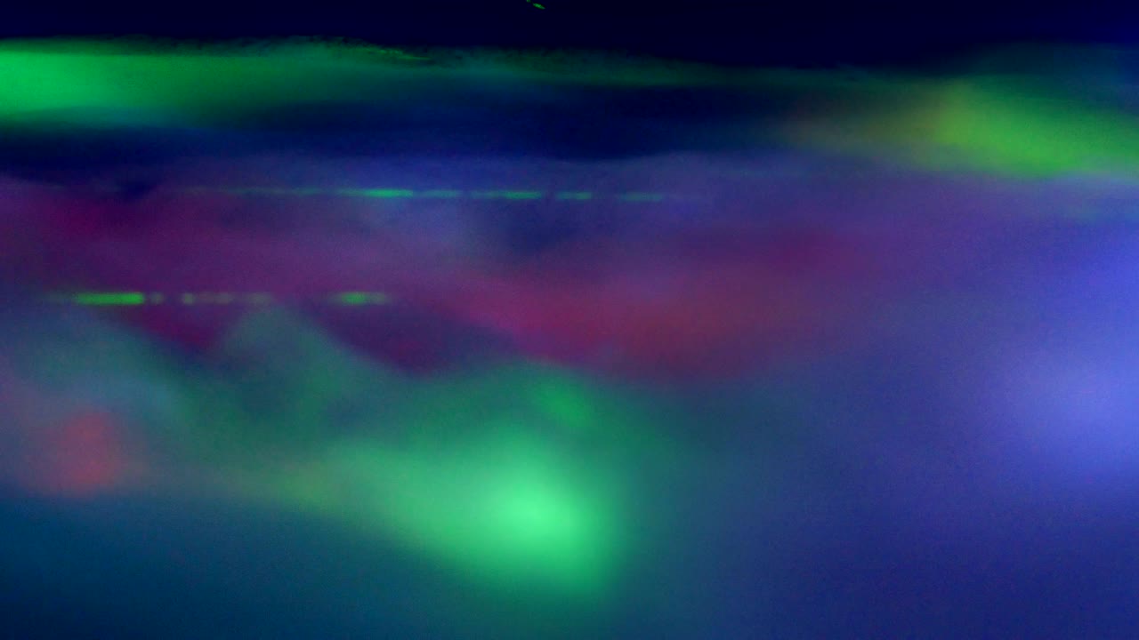 다채로운 빛은 추상적인 레이저 배경을 흐릿하게 만니다.