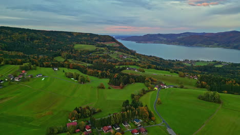 verdant landscape of attersee in austrian countryside next to lake