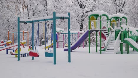empty swing in the winter