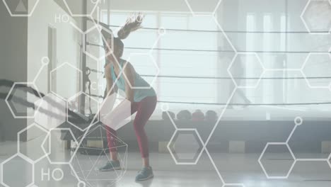 Animation-of-data-processing-over-caucasian-woman-exercising-with-ropes-in-gym