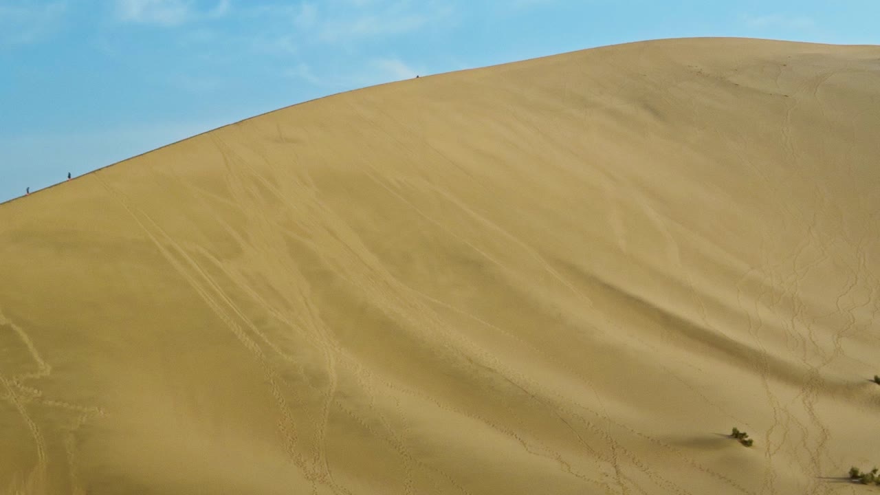 Desert Mountain Scenery At The Mingsha Mountains (Echoing-Sand Mountain) Near Dunhuang In Gansu Province, China. Panning Shot