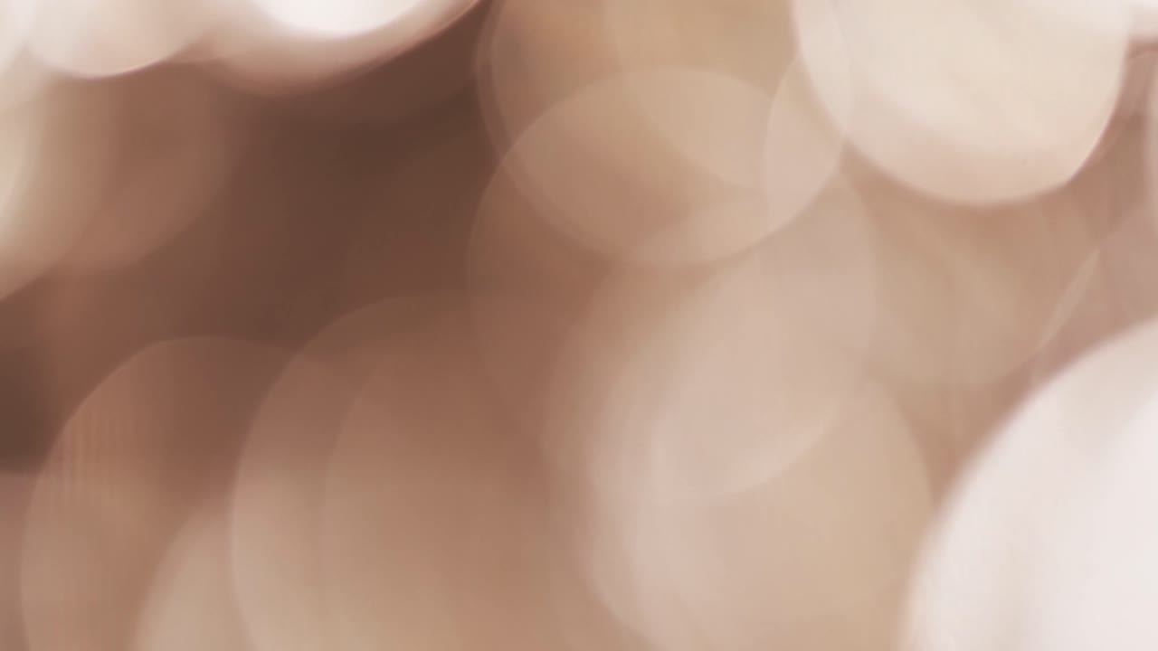 video de puntos de luz bokeh amarillos parpadeantes con espacio de copia