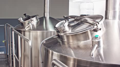 stainless steel tanks in a brewery