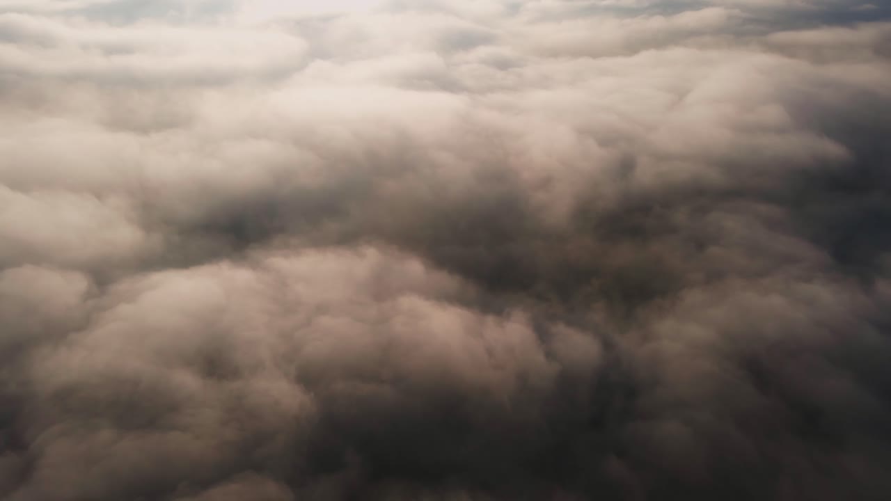 Aerial flyover close to pollution smoke clouds, dangerously poor air quality