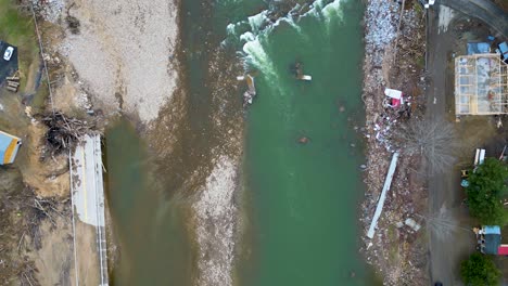 4k aerial drone video of disabled bridge across the nolichucky river in erwin, tn caused by flooding from hurricane helene (2024)