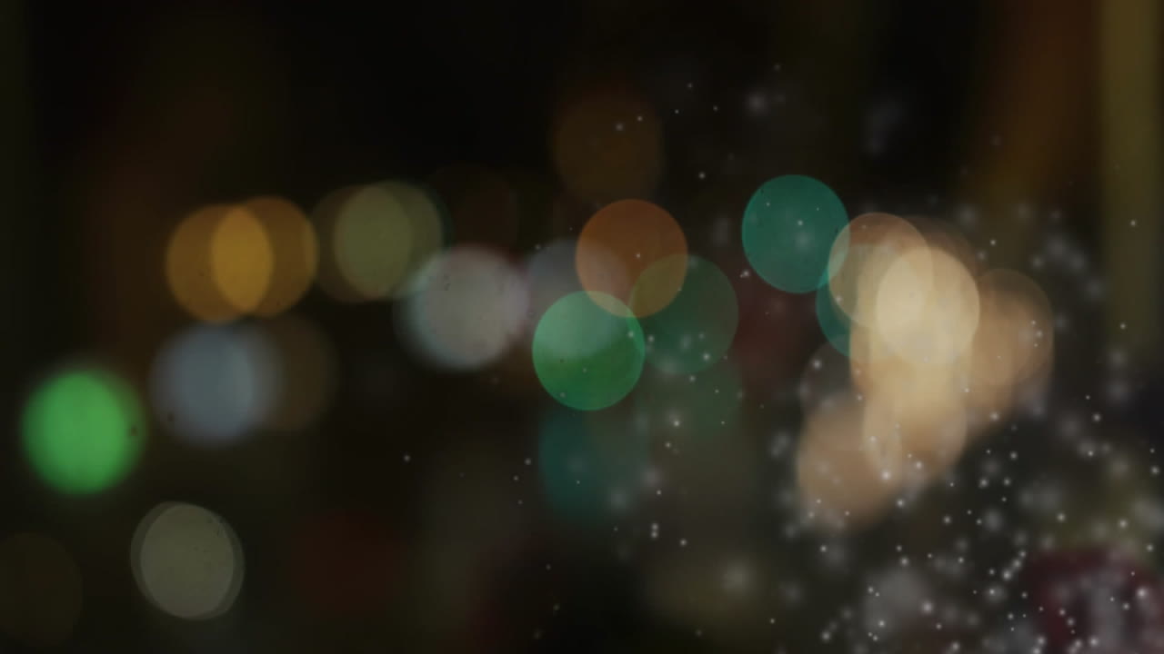 caída de copos de nieve y luces bokeh animación en fondo oscuro