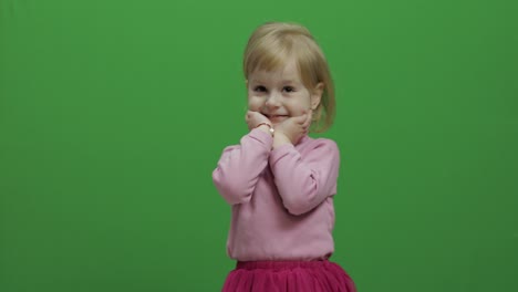 Happy-three-years-old-girl.-Cute-blonde-child.-Dancing-and-make-faces