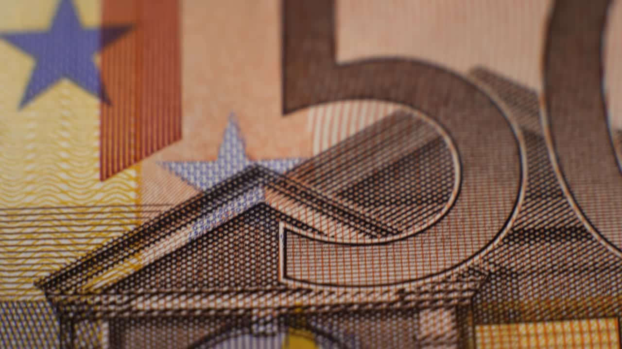 50 유로 종이 화폐의 클로즈업, 종이 화돈의 작은 세부 사항을 보여줍니다.